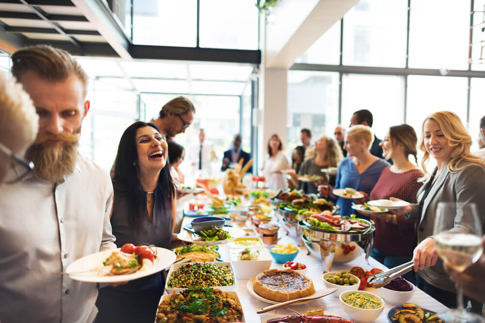 In this image you will see people are enjoyed food and event.