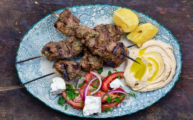 This is a picture of a delicious Mediterranean dish called lamb kabob