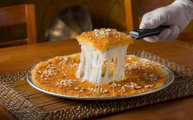 In this picture you will see a Mediterranean dessert called kunafa