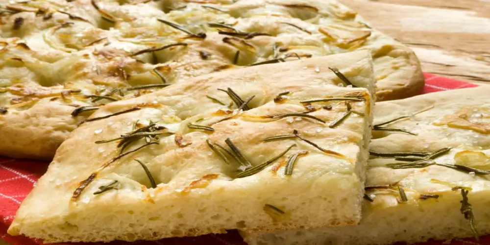 In this image you will see a focaccia mediterranean bread.